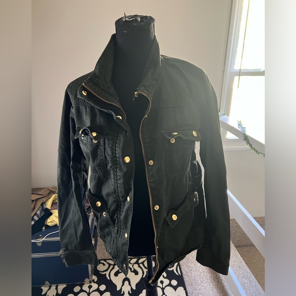 J. Crew medium sized olive green jacket with golden zips and buckles